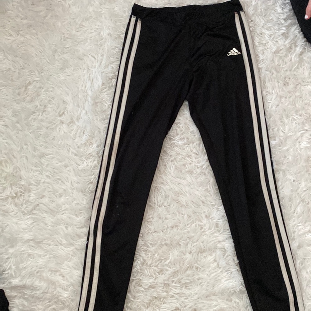 adidas kids leggings. Size-kids large/14. Color-Black with white stripes.